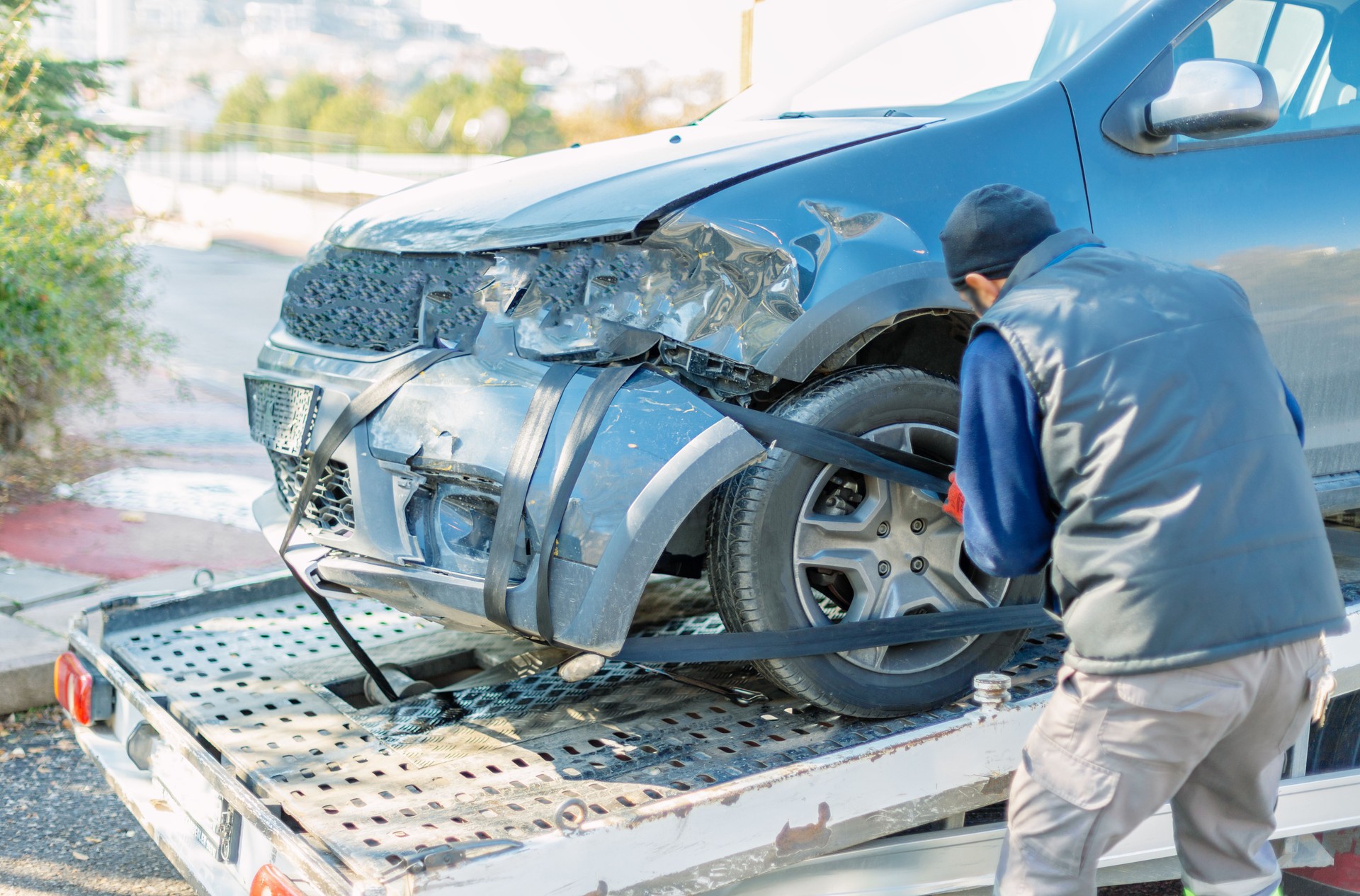 Car loaded onto tow truck